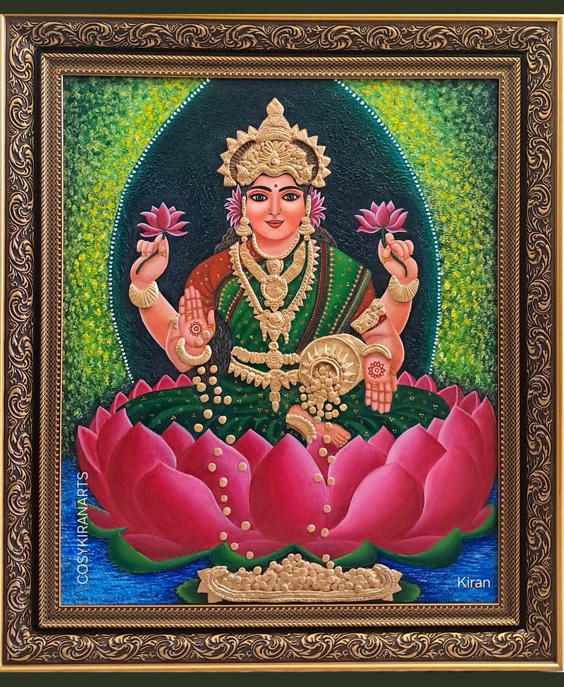 Framed painting of Goddess Lakshmi seated on a lotus